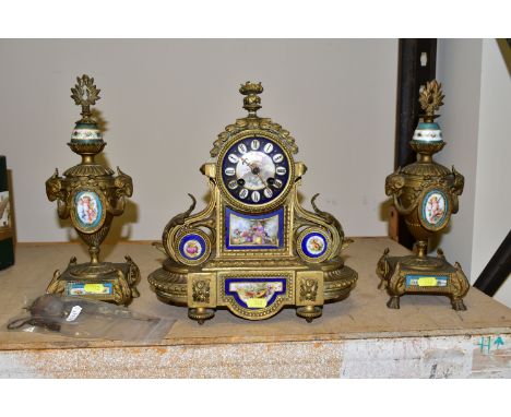 A FRENCH STYLE GILT METAL CHIMING MANTLE CLOCK, hand painted porcelain dial and inset plaques, approximate height 31cm, toget