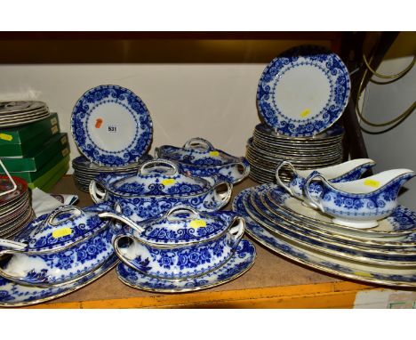 T. RATHBONE &amp; Co FLOW BLUE OSBORNE PATTERN PART DINNER SERVICE, comprising five graduated platters, twelve 26cm plates,  