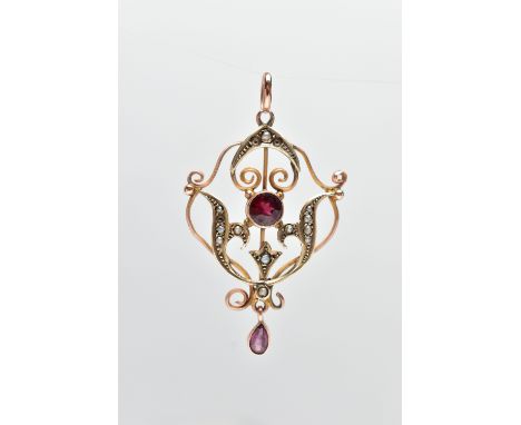 AN EDWARDIAN GEM SET PENDANT, openwork pendant set with a circular cut ruby and a pear cut amethyst dropper, detailed with sp
