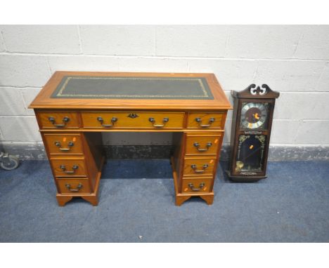 AN OAK PEDESTAL DESK, with an arrangement of eight drawers, length 102cm x depth 46cm x height 76cm (condition:-later removab