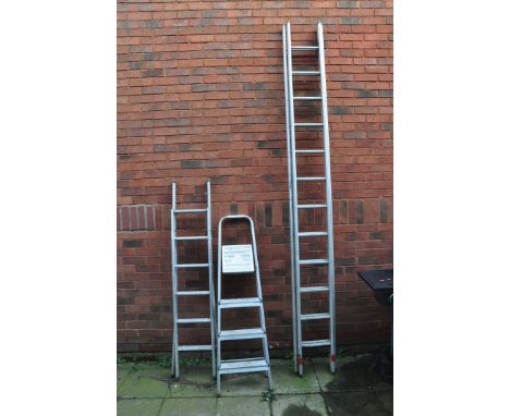 AN ALUMINIUM DOUBLE EXTENSION LADDER with 12 rungs to each 300cm length along with two sets of aluminium ladders (3)
