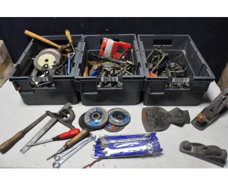 THREE TUBS CONTAINING A LARGE COLLECTION OF VINTAGE TOOLS to include planes, saws, cutting discs, chisels, tin snips, Sandvik