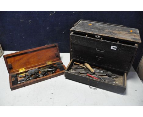 AN ENGINEERS TOOL CHEST containing some marking tools, files, micrometer, chisels etc. along with a cased combination square 