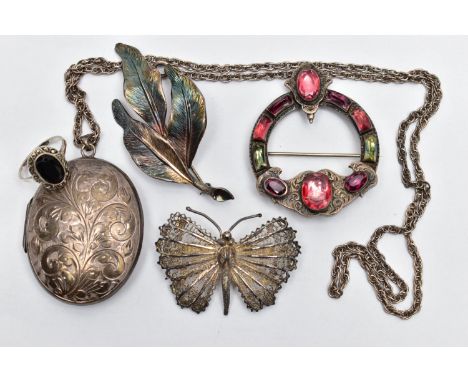AN ASSORTMENT OF SILVER AND WHITE METAL JEWELLERY, to include a large silver locket, oval form, engraved with a foliage desig