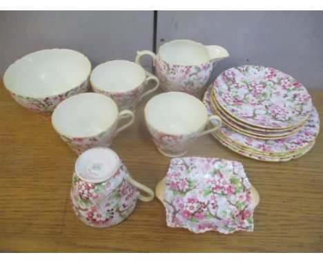 A Shelley Maytime pattern on four place setting tea set and an ash trayLocation: 