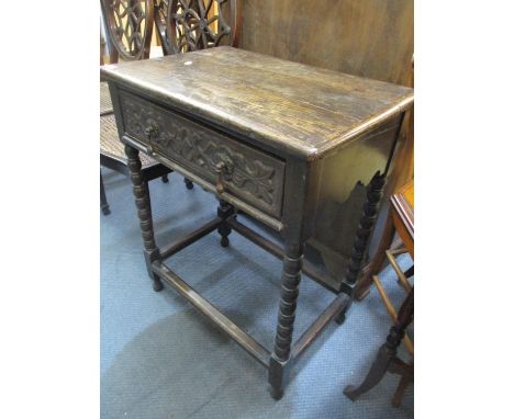 An early 20th century oak single drawer side table on bobbin turned supports, 75h x 61w 