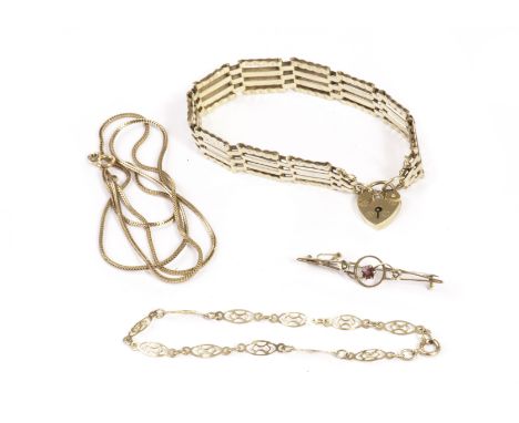 Four 9ct gold items of jewellery, including a gate link bracelet, a gem set bar brooch, a chevron link chain necklace and a f
