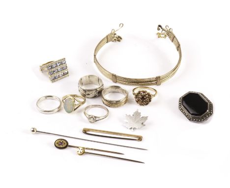 Three gold and gem set rings and other jewellery, including a large dress ring, an opal solitaire and a garnet set example, t