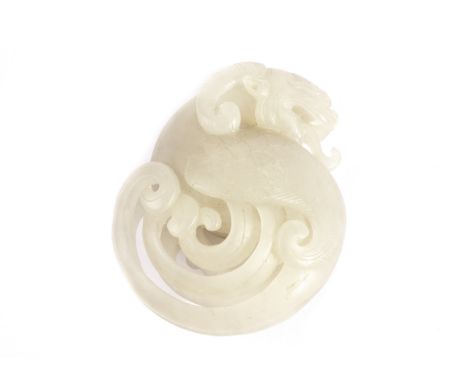 A fine Chinese hardstone sculpture, the small piece of opaque white jade style stone carved and engraved as a mythical creatu