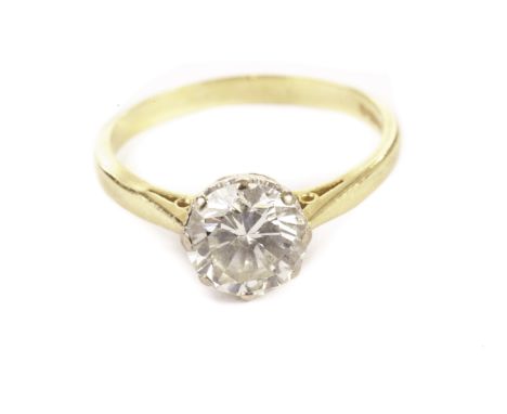 A diamond solitaire engagement ring, having an approx 1.6ct brilliant cut in a platinum crown mount on an 18ct gold band the 