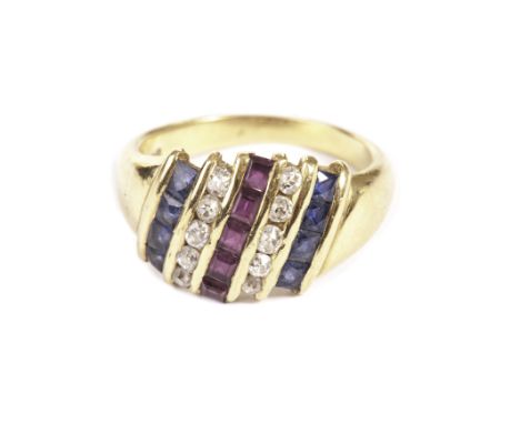 An 18ct gold and gem set dress ring, the tablet set with columns of brilliant and square cut rubies, sapphire and diamonds, h