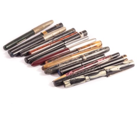 A collection of fourteen Art Deco and later fountain pens, including two Golden Platignum examples, a Burnham fountain pen, a