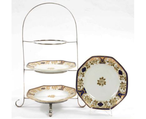AN EPNS THREE TIER CAKE STAND AND SET OF THREE NORITAKE OCTAGONAL COBALT AND RAISED GILT PLATES, 42CM H, PRINTED MARK, C1925