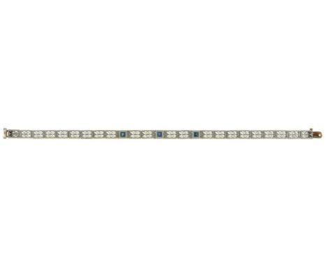 AN EDWARDIAN SAPPHIRE BRACELET IN PLATINUM AND GOLD++LIGHT WEAR CONSISTENT WITH AGE 