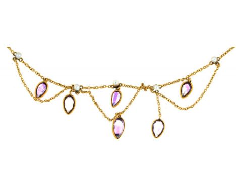 AN EDWARDIAN PEAR SHAPED AMETHYST AND PEARL FESTOON NEKLACE, IN GOLD MARKED 15C, 5G++IN GOOD CONDITION