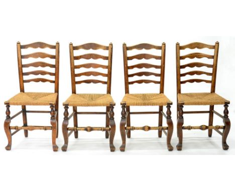 A SET OF FOUR VICTORIAN ASH LADDER BACK RUSH SEATED DINING CHAIRS 