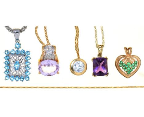 A TOPAZ PENDANT IN 9CT GOLD ON 9CT GOLD CHAIN, AN AMETHYST PENDANT IN GOLD MARKED 9K, ON GOLD CHAIN MARKED 9CT, A 9CT GEM SET