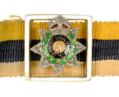 ARMY SERVICE CORPS. A WWI SWEETHEART'S BRACELET, THE BUCKLE WITH ROSE CUT CUT DIAMONDS SET IN GOLD WITH BLUE ENAMELED GARTER 