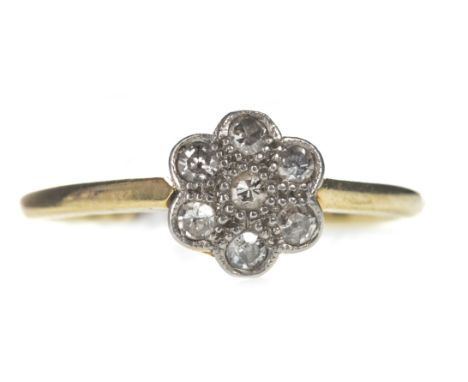 DIAMOND DAISY CLUSTER RING, set with single cut diamonds totalling approximately 0.40 carats, marked 18CT and PLAT, size O, 2