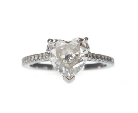 HEART SHAPED DIAMOND DRESS RING, the heart shaped diamond of approximately 2.55 carats with round brilliant cut diamonds to t