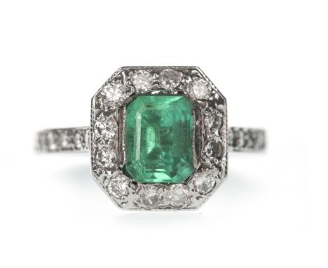 EMERALD AND DIAMOND RING, the central step cut emerald of approximately 1.27 carats within a halo of round brilliant cut diam