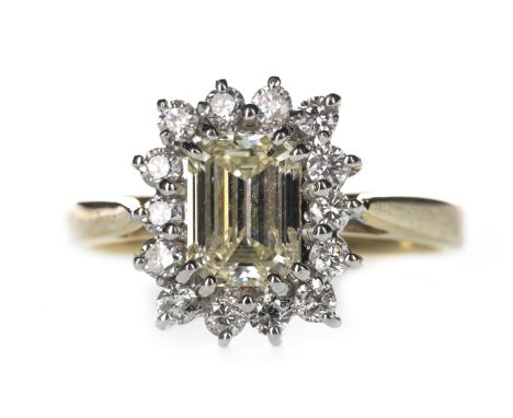 YELLOW DIAMOND CLUSTER RING, set with a yellow emerald cut diamond of approximately 1.04 carats, within a halo of round brill