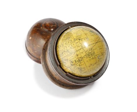 A William IV miniature terrestrial globe by Newton &amp; Son, the 3in globe made of twelve hand-coloured engraved gores, insc