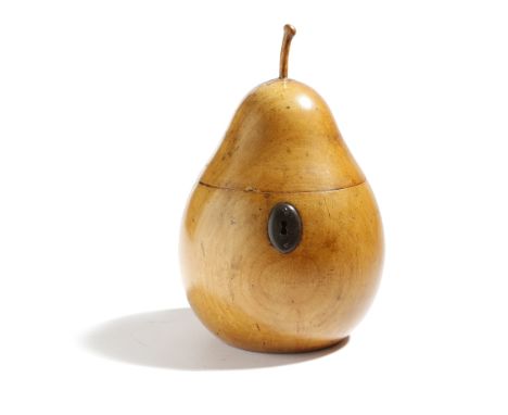 A treen fruitwood tea caddy in the form of a pear, with a stalk finial, the hinged lid revealing a foil lined interior, with 