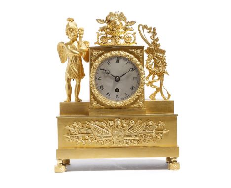 A 19th century French ormolu mantel clock, with a brass drum movement stamped '105', the silvered dial with Roman numerals, t