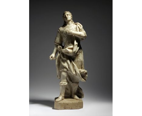 An 18th century marble figure of a man, thought to be St. Sebastian, wearing a billowing cloak over foliate engraved armour, 