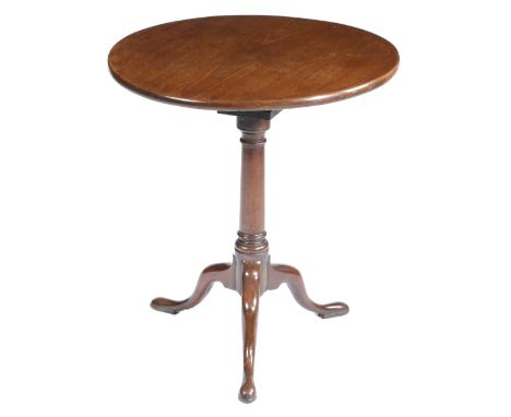 A George II mahogany tripod table, the circular tilt-top revolving on a birdcage, above a turned stem and on cabriole legs wi