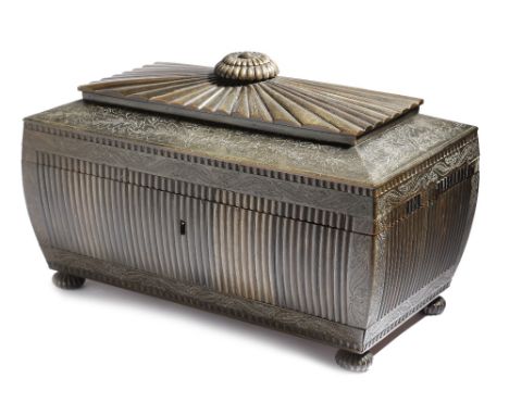 λ A 19th century Anglo-Indian buffalo horn tea chest, of sarcophagus shape, all over engraved with scrolling leaves and flowe