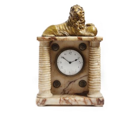 An early 19th century marble portico clock holder, with a gilt recumbent lion on ribbed columns, flanking a pocket watch with