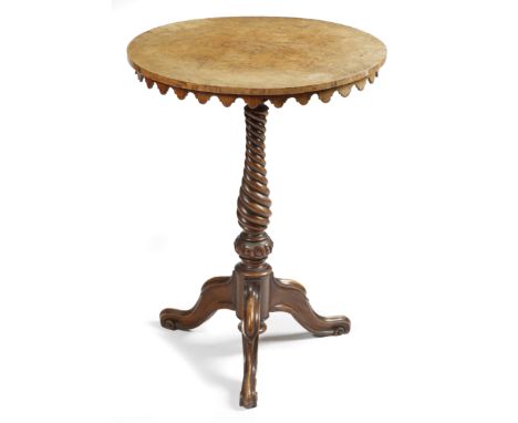 A Victorian walnut occasional table, the circular burr veneered top on a spiral twist stem and tripod scroll supports, 71.7cm