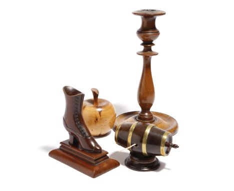 A small collection of treen, comprising: a lignum vitae and brass bound string barrel, a boot vesta holder, a candlestick wit