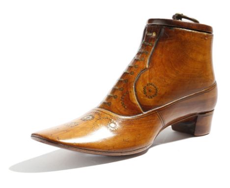 λ A large and rare 19th century treen fruitwood table snuff shoe, with brass laces and tack decoration and inlaid with ivory 