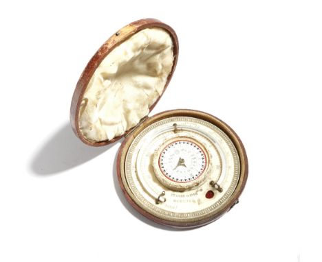 λ An early Victorian ivory pocket sundial and thermometer, with carved decoration, the curved scale in Fahrenheit and Reaumur