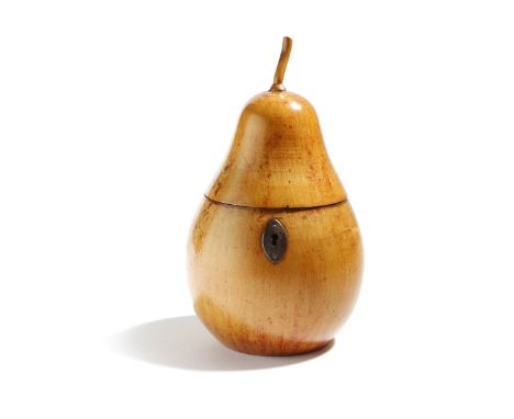A treen fruitwood tea caddy in the form of a pear, with a stalk finial, the hinged lid revealing a foil lined interior, with 