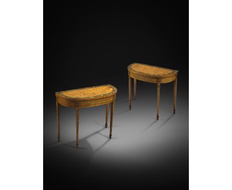 A pair of George III satinwood and painted card tables in the manner of Seddon, Son and Shackleton, inlaid with stringing and