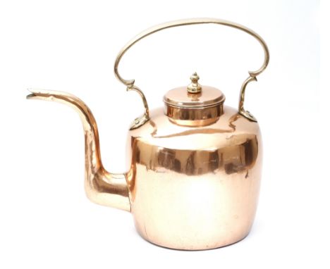 A large Victorian copper kettle, with a brass handle and finial, 52cm high, 52cm wide. Provenance: The estate of the late Joh