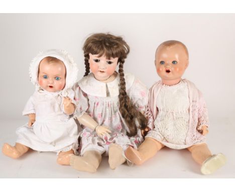 Three German bisque-head dolls. Heubach Kopplesdorf bisque-head baby doll, brown wig, brown sleeping eyes, open mouth with fo