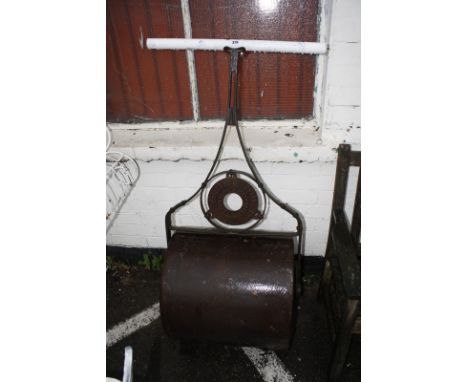 A cast iron lawn roller made by Barford & Perkins of Peterborough, with later handle. Best Bid