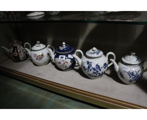 Assorted tea pots to include two Worcester tea pots with blue crescent mark to base (AF), a Worcester milk jug (AF) and three