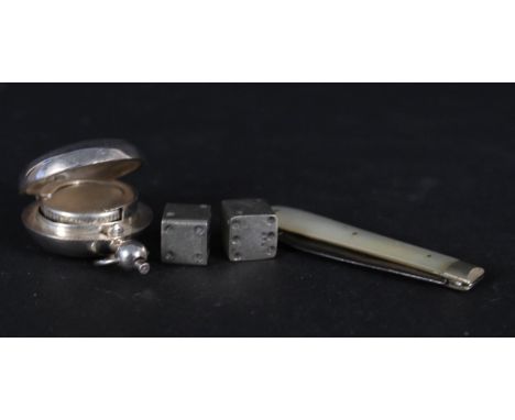 A modern silver sovereign holder, a silver bladed mother of pearl fruit knife, two white metal dice stamped 925