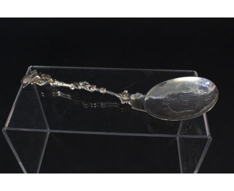 An unusual silver combination spoons and fork, the bowl with three slot compartments for fork prongs to sit, the bowl is deco