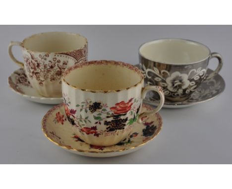 Three various late 19th/ early 20th century greedy tea cups and saucers