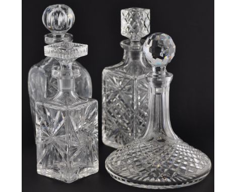 A Bohemian cut glass ship's decanter together with three spirit decanters