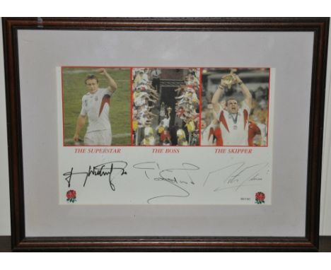 An England RFU 2003 World Cup commemorative photograph signed by and depicting Wilkinson and Johnson, 18 x 28cms