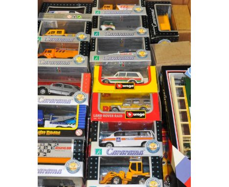 A large quantity of toy vehichles, to include Cararama, Solido and Corgi Cameo, all boxed