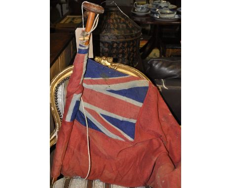 A vintage Royal Navy launch bow flagpole with Royal Ensign